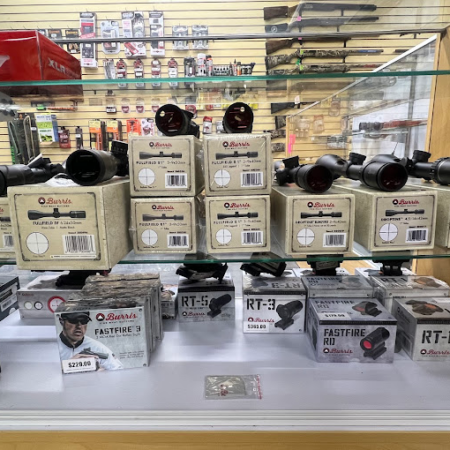 rifle scopes display in store