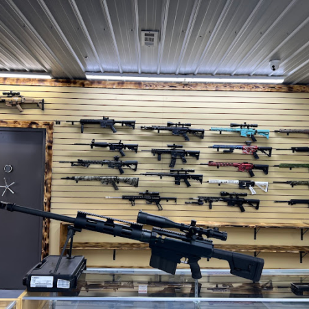 Gun store rifles on wall