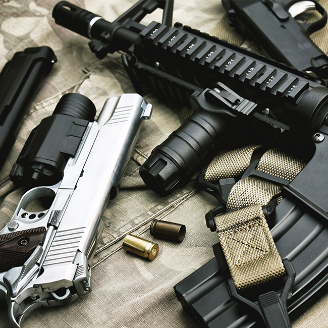 handguns rifles and ammunition display
