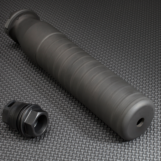 Rifle suppressor with mounting adapter